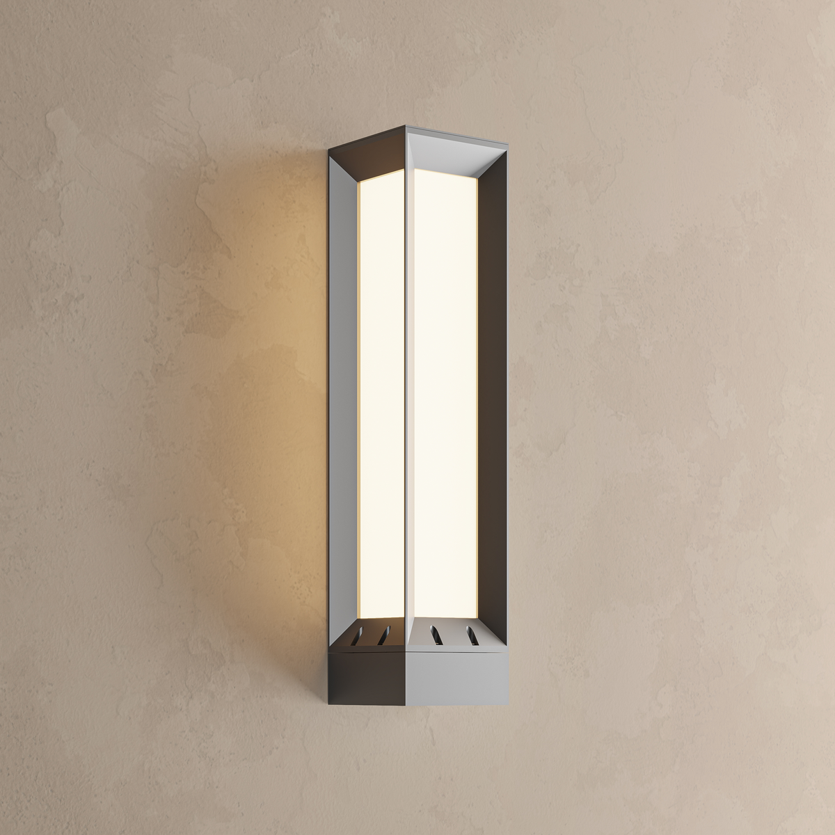 Applique extérieure LED noire en inox allumée en blanc chaud, panneau lumineux opalin sur un mur enduit
