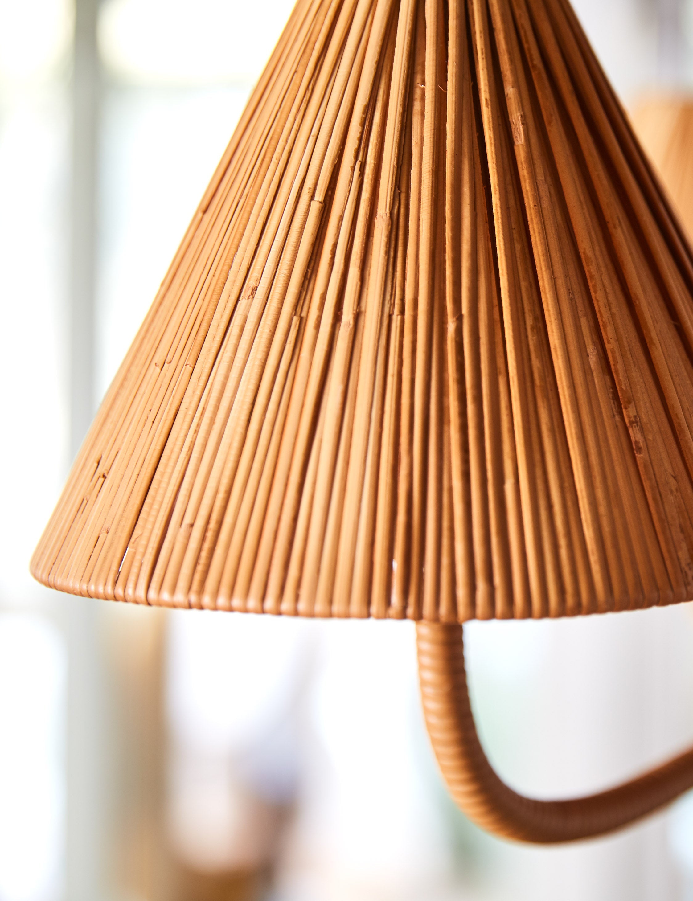 Lustre design Laurent en sustainably harvested rotin