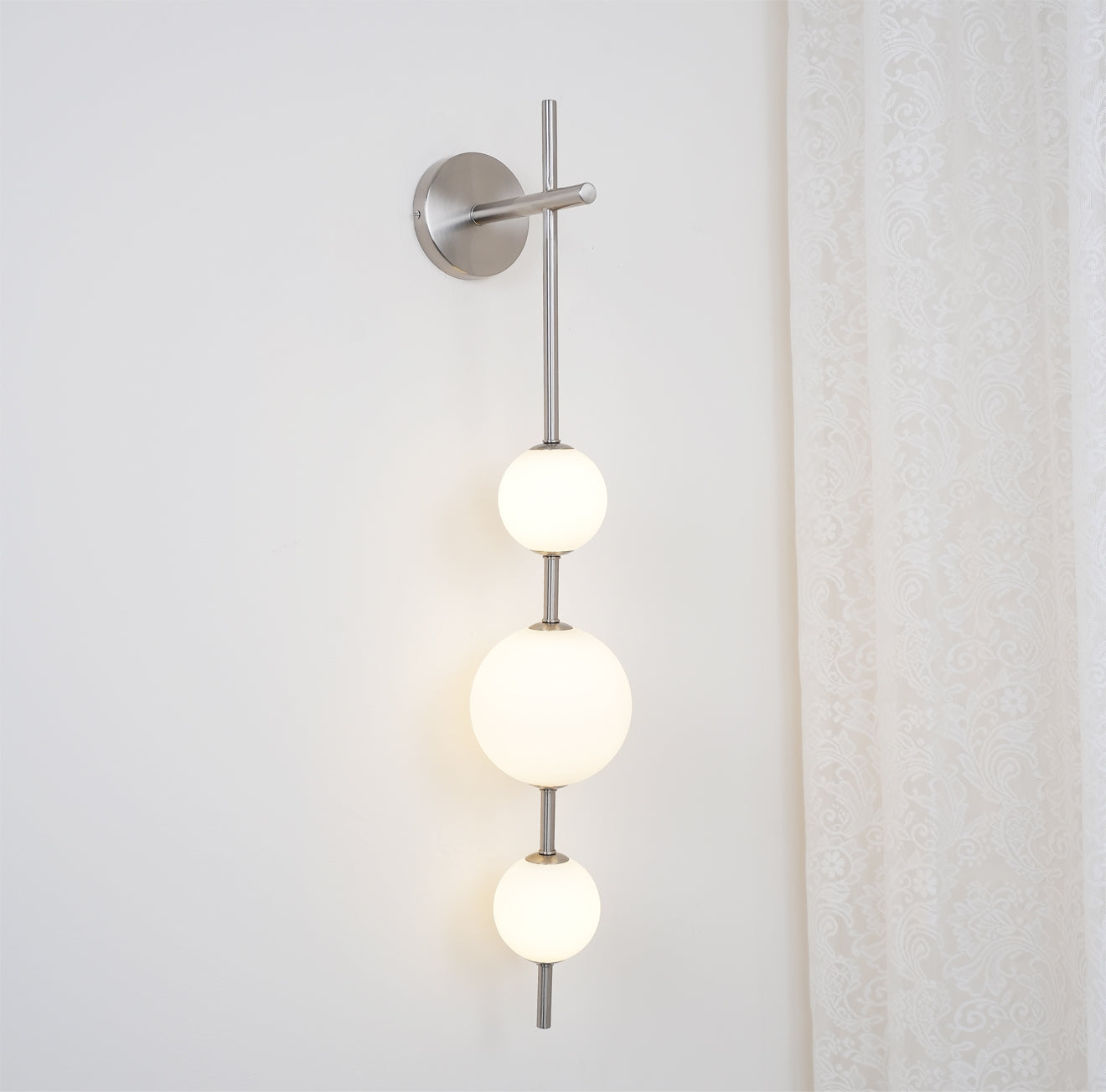 Applique murale moderne Lauritz en Noir et verre sphère