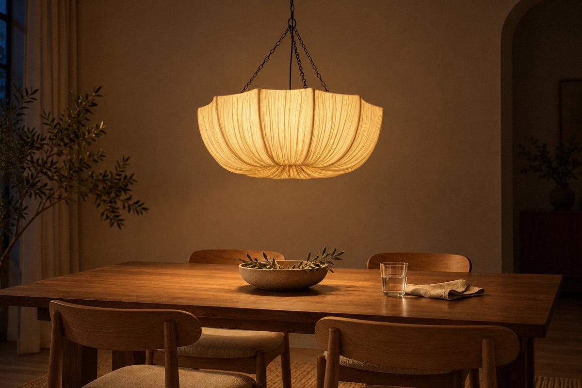 Aldwin fabric pendant in a dining room at night, lit (AI-generated scene)