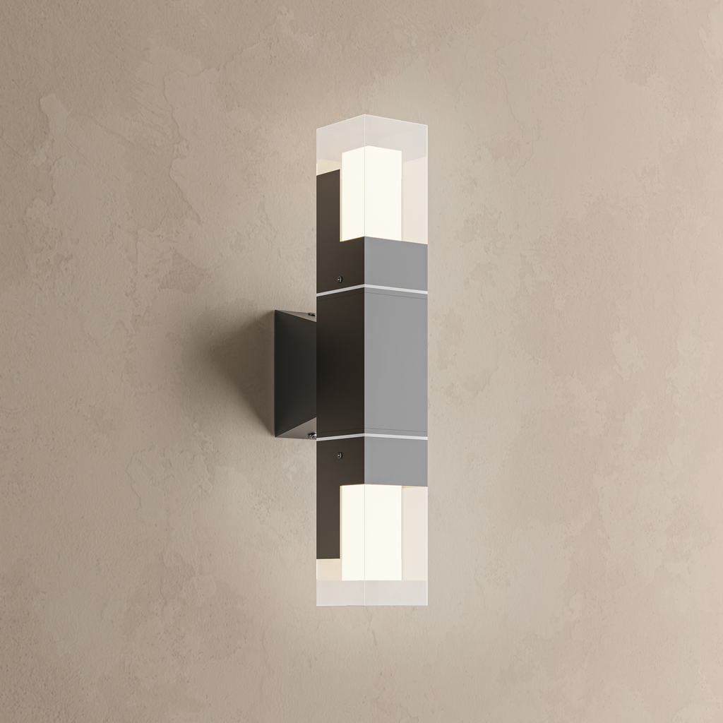 Applique extérieure LED noire, modèle double allumé en haut et en bas sur un mur beige