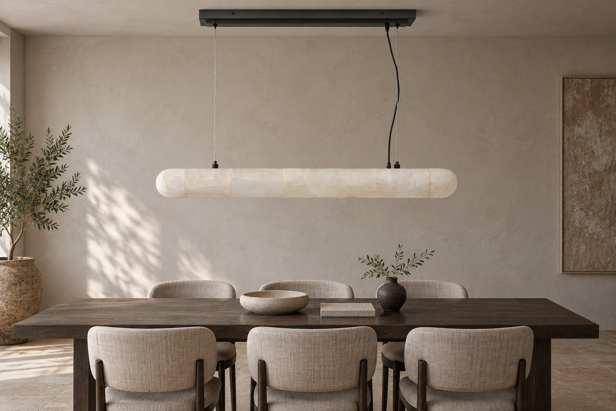 Lilio Linear Calcite Chandelier stone pendant in a dining room by day, switched off (AI-generated scene)