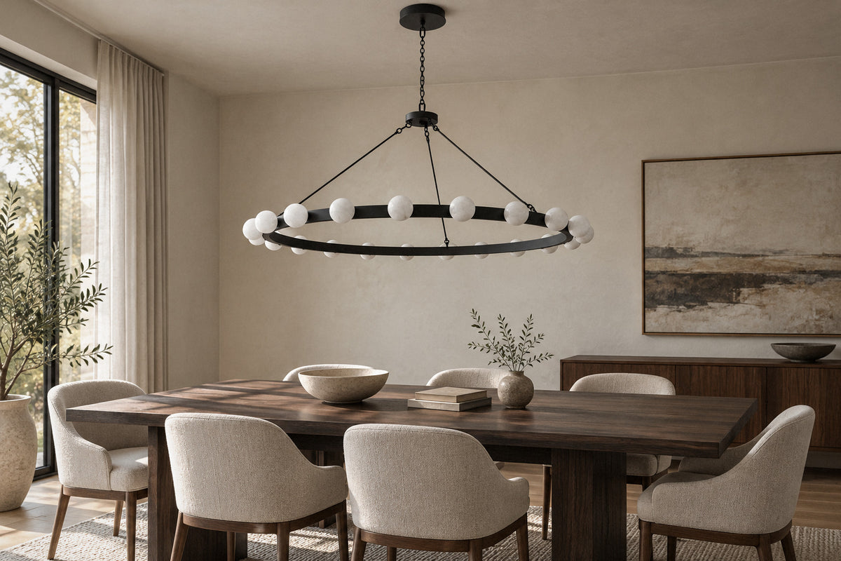 Lodaen Globe Ring matte-black metal chandelier in a dining room by day, switched off (AI-generated scene)