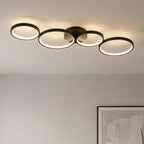 Plafonnier LED 4 anneaux noir 88 cm - mise en situation