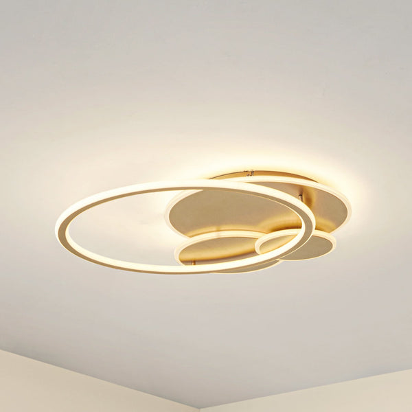 Plafonnier LED doré allumé en situation
