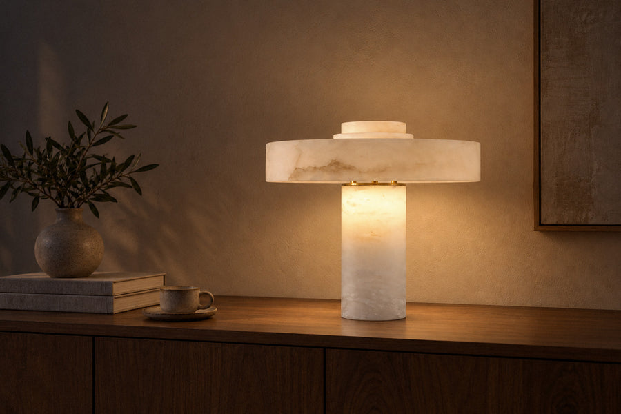 Plinth Alabaster Table Lamp, alabaster table lamp in a living room at night, lit (AI-generated scene)