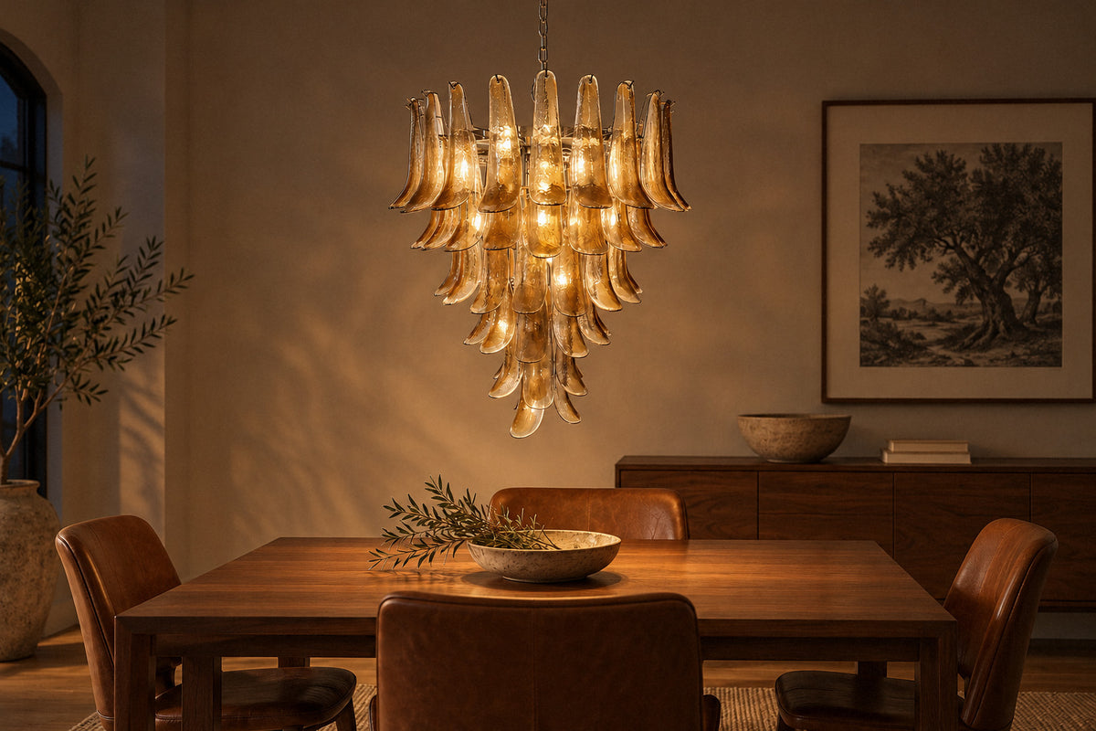 Solenne Glass Chandelier amber glass chandelier in a dining room at night, lit (AI-generated scene)