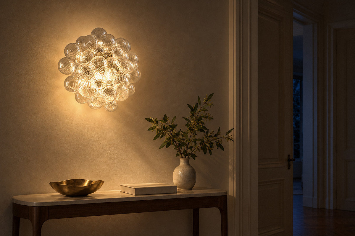 Vavais Globe Bubble glass wall sconce in a hallway at night, lit (AI-generated scene)