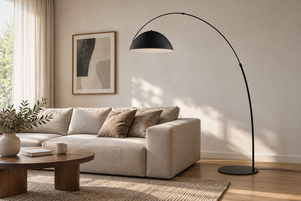 Verse Arc Floor Lamp black metal floor lamp in a living room by day, switched off (AI-generated scene)